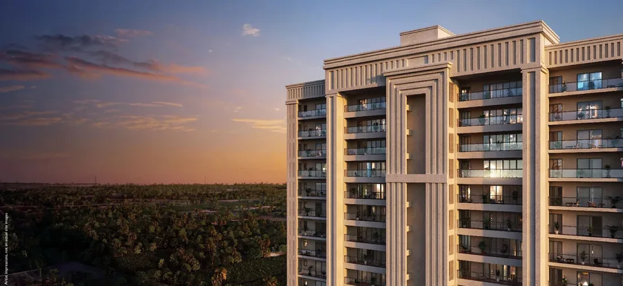 Godrej Verano tower at sunset with Aravalli greens in the background